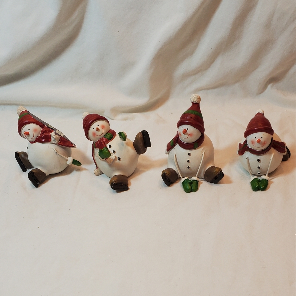 Coldwater Creek Skating Snowmen Figurines EUC Set Of 4